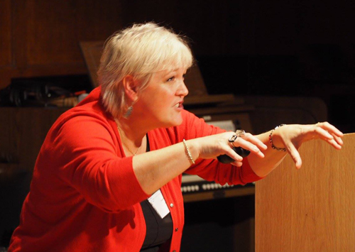 Janet directing a choral workshop